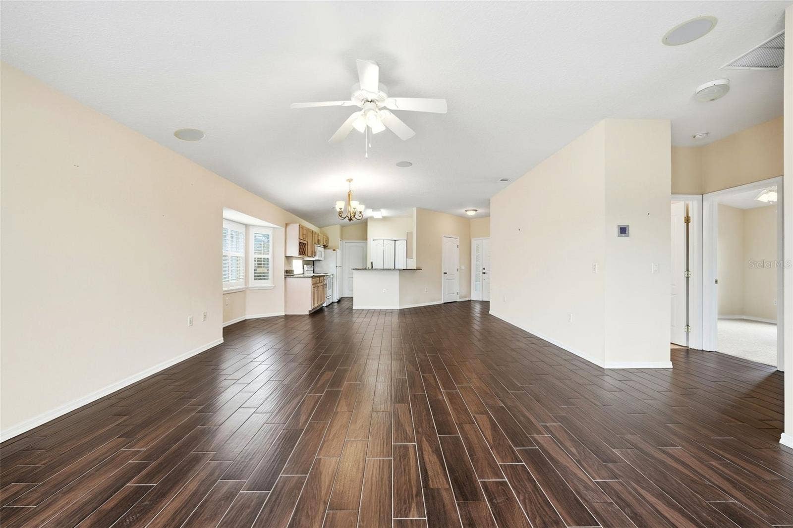 2311 N ANDREA POINT, Lecanto, FL 34461 View from lanai into great room, dining, kitchen areas and hallway to Bedroom 2 and Guest Bath!