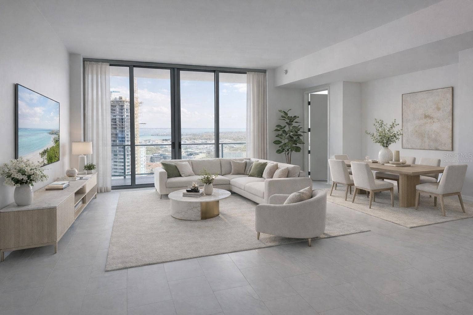 400 CENTRAL AVENUE, #2603, St Petersburg, FL 33701 Living / Dining Room with Access to 52' Balcony in the Sky - Virtually Staged