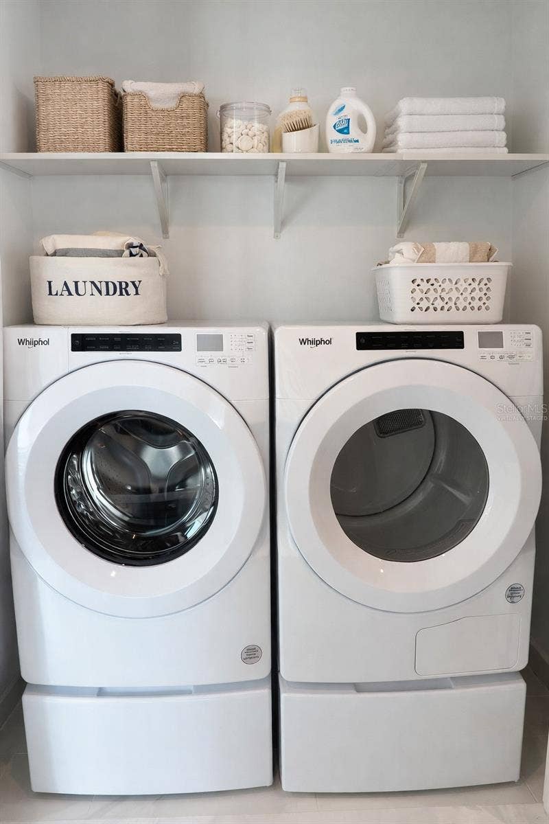 400 CENTRAL AVENUE, #2603, St Petersburg, FL 33701 Laundry Closet with Washer & Dryer Including Pedestals - Virtually Staged