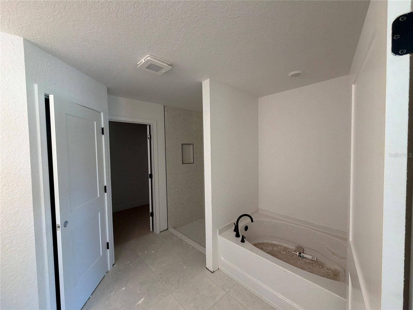 7 BAHIA PASS LANE, Ocala, FL 34472 Under construction. Current state of build as of 9-5-26. Master Bath.