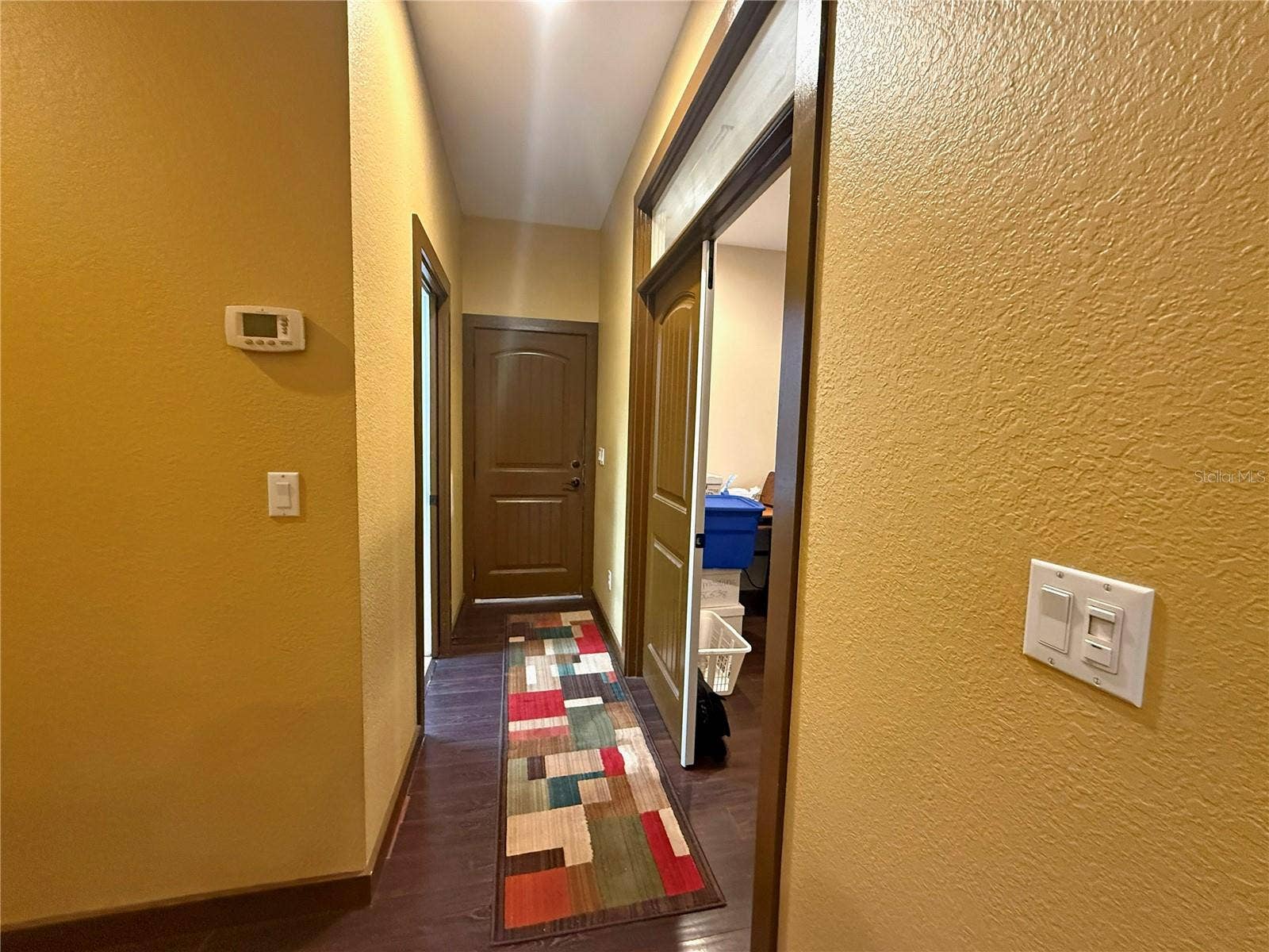11691 SW 52ND AVENUE, Ocala, FL 34476 Hallway to Garage