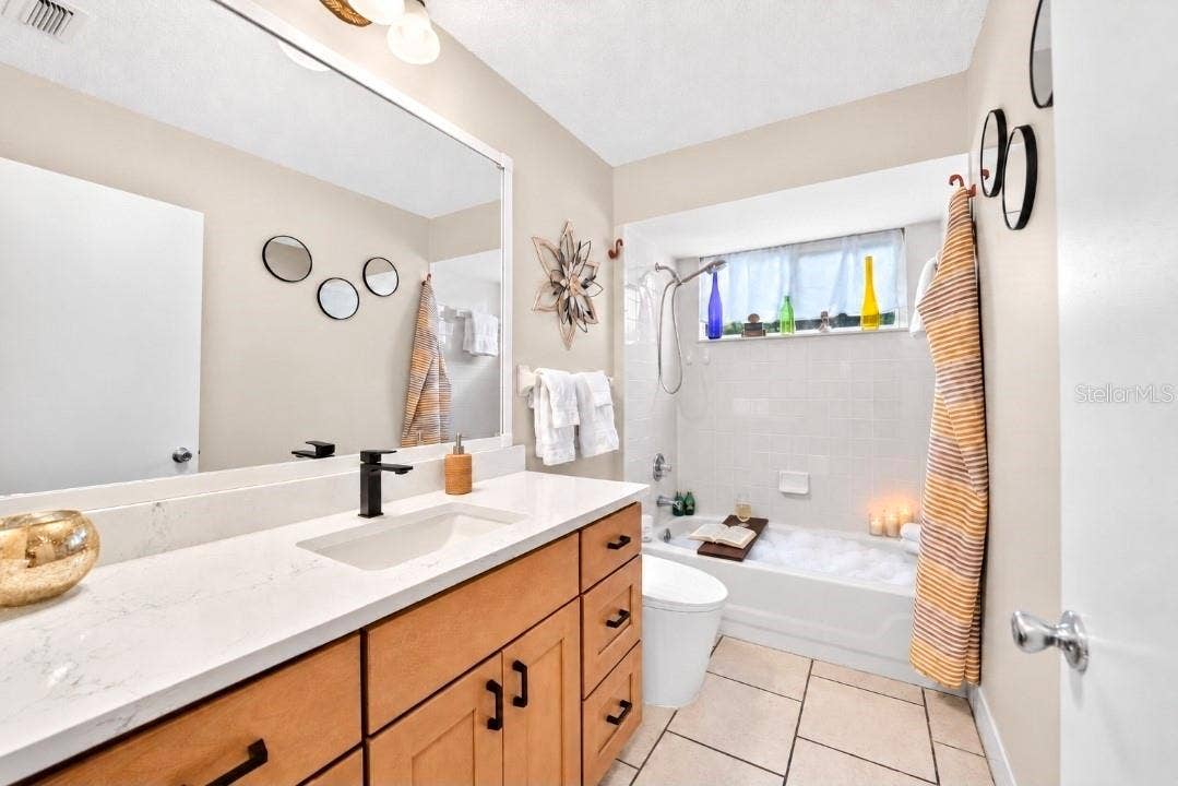 9282 SW 109TH LANE, Ocala, FL 34481 Guest Bath with QUARTZ, new ergo vanity, faucet, lights