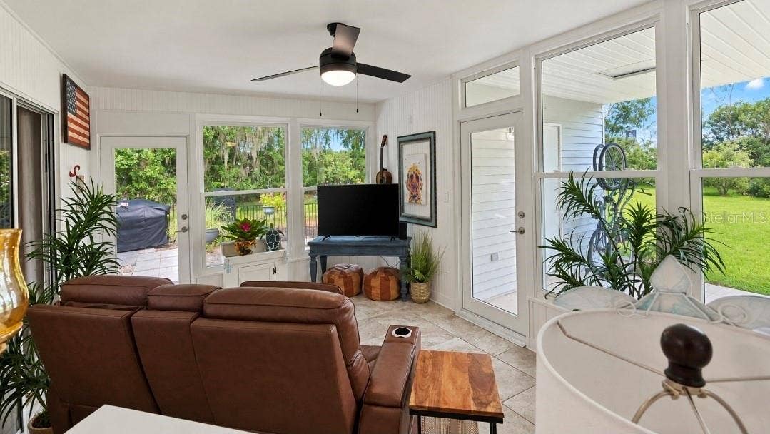 9282 SW 109TH LANE, Ocala, FL 34481 Look at those NEW Hurricane Windows- all that natural light. Its all done-you dont have to do anything but move it and start living the luxury life in the Most Affordable Resort Style Living Community.