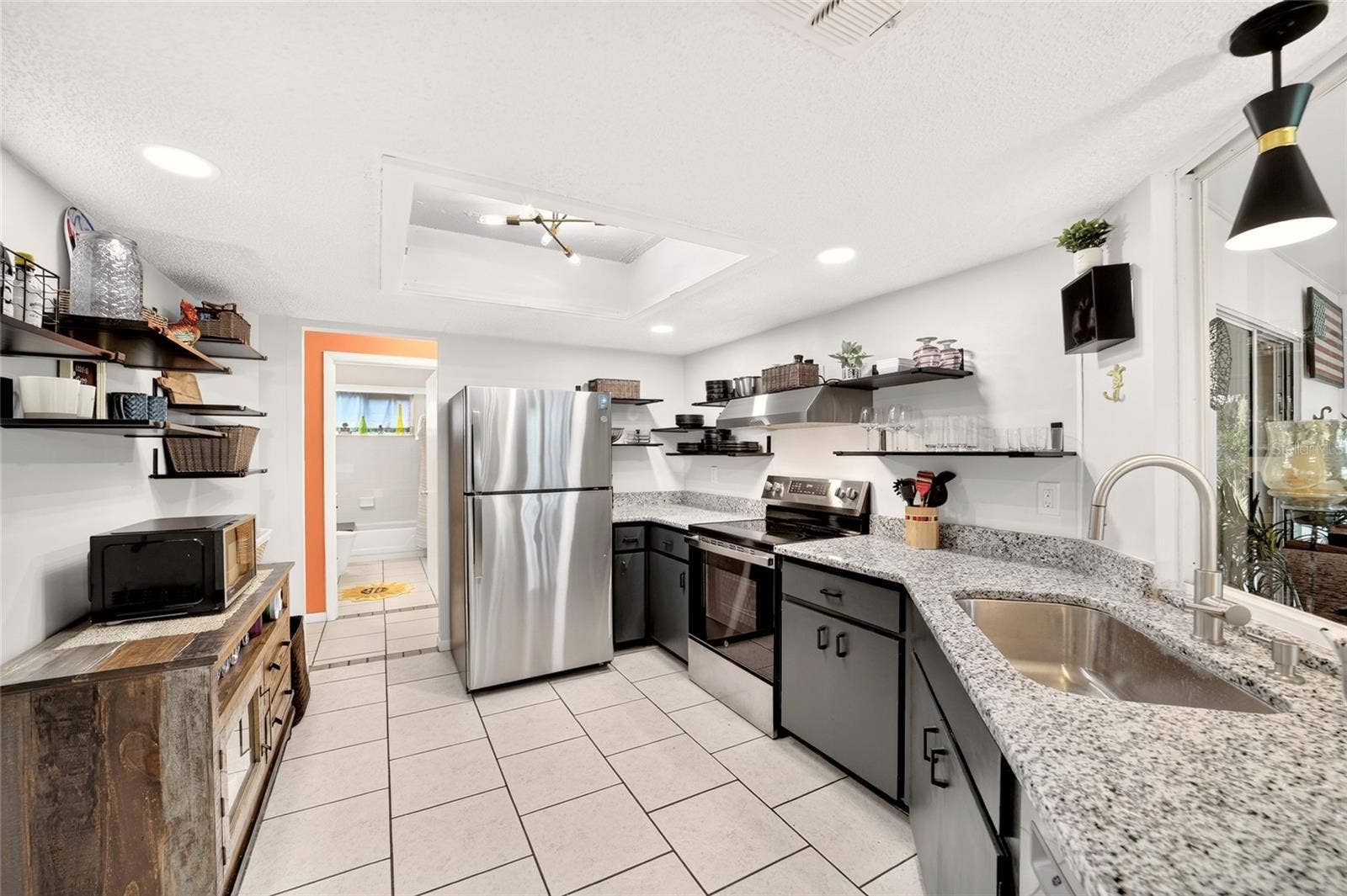 9282 SW 109TH LANE, Ocala, FL 34481 It has everything you need and the appliances you want with the SS dishwasher too