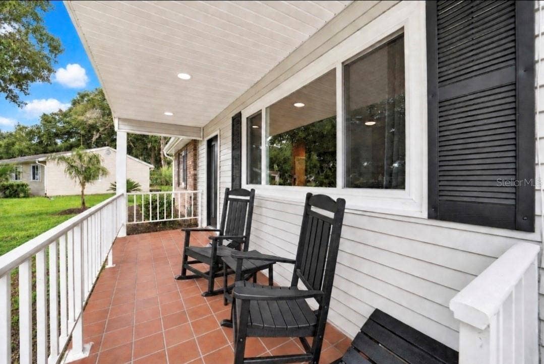 9282 SW 109TH LANE, Ocala, FL 34481 Inviting Front Porch with new windows,ceiling, LEDs and ROOF 2022