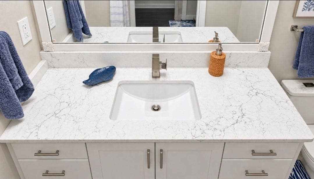 9282 SW 109TH LANE, Ocala, FL 34481 Quartz completes this look. modern sink, modern faucet and ergo height vanity