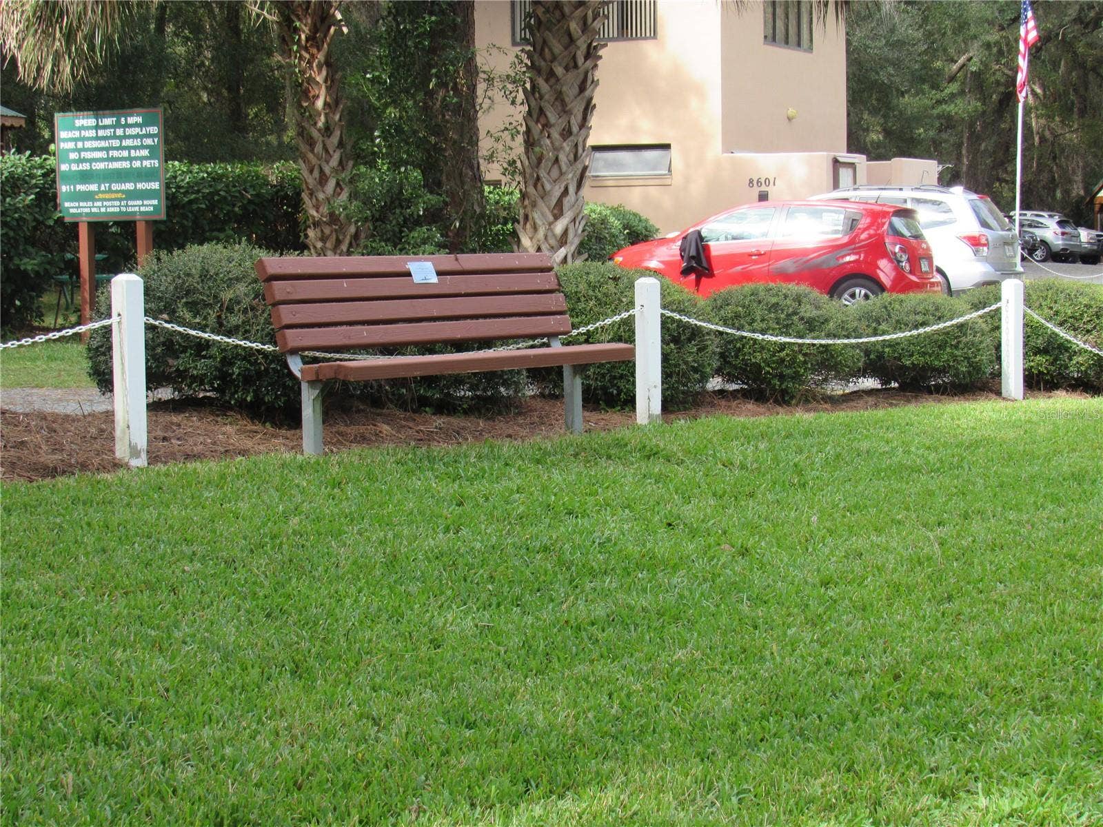 19588 SW 86TH LANE, Dunnellon, FL 34432 memory bench in grassy area overlooking swim area at River Park