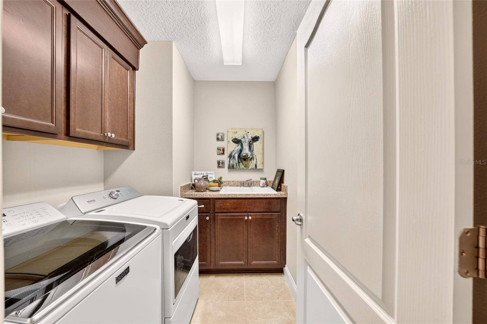 3464 N VONNEGUT POINT, Beverly Hills, FL 34465 Laundry Room with Wet Sink and Cabinets