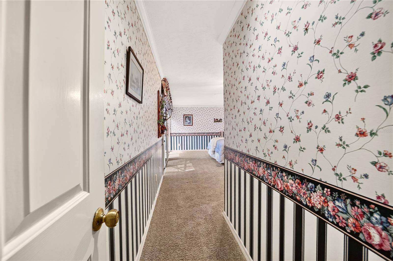 1708 NE 38TH AVENUE, Ocala, FL 34470 Entry to the primary bedroom offers additional privacy.