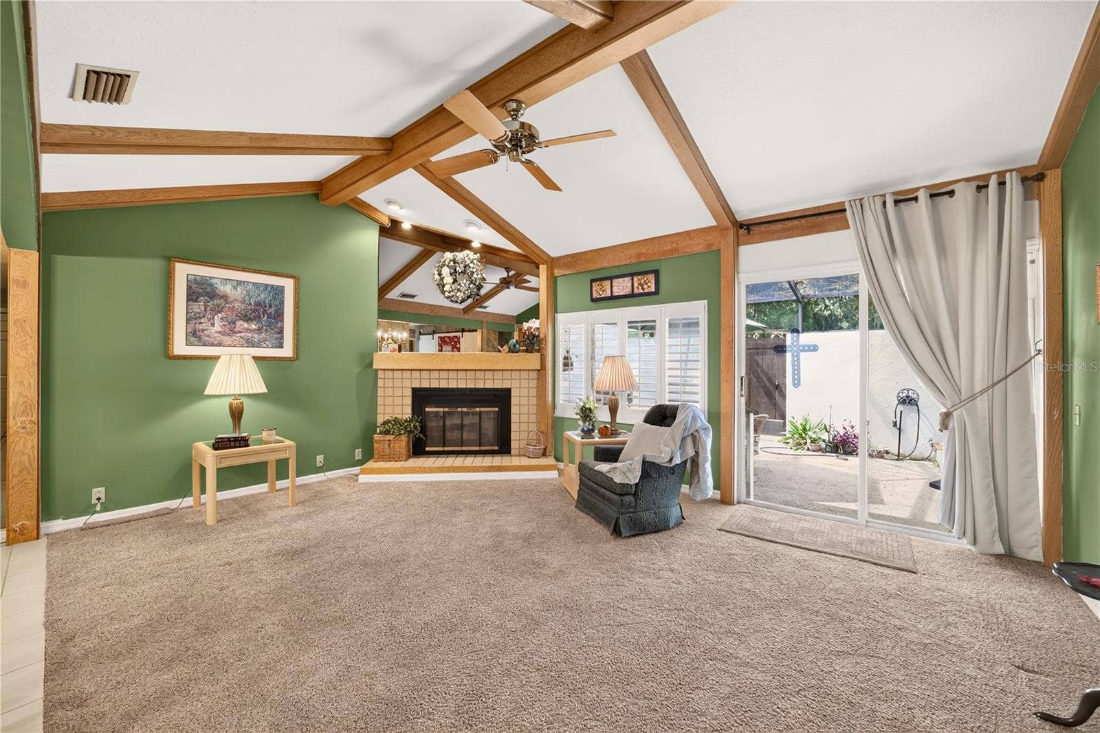 1708 NE 38TH AVENUE, Ocala, FL 34470 Down the hall you will see the large living room with fireplace