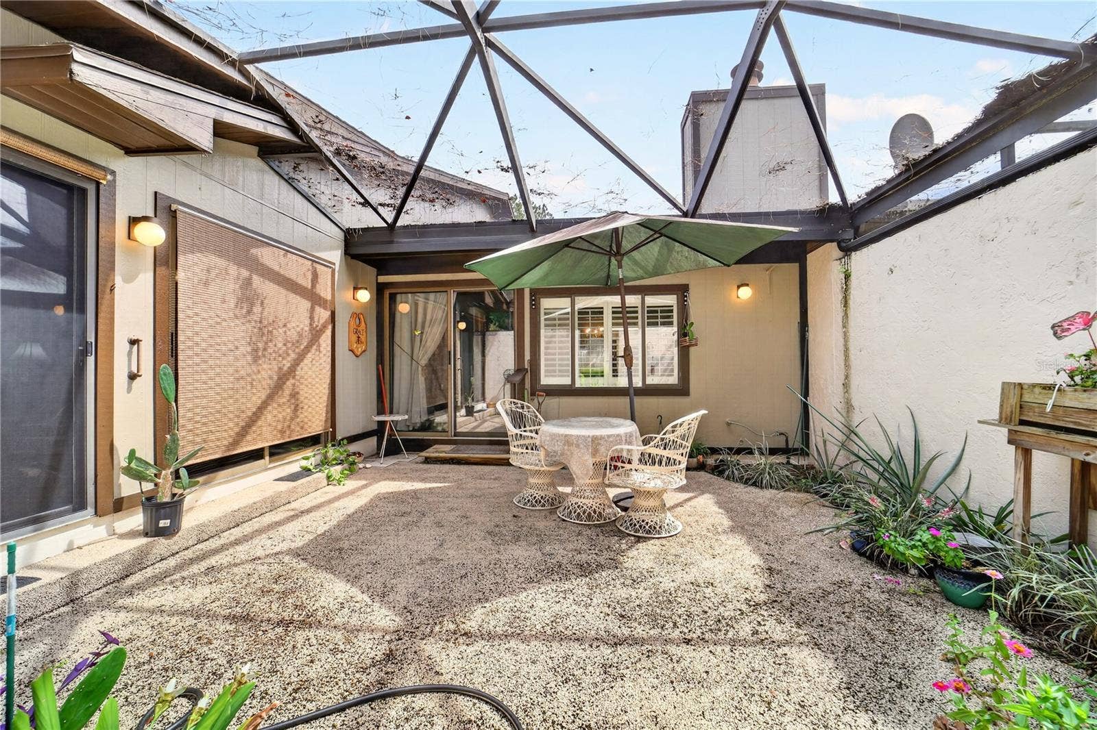 1708 NE 38TH AVENUE, Ocala, FL 34470 Enjoy the back porch and the gardening options