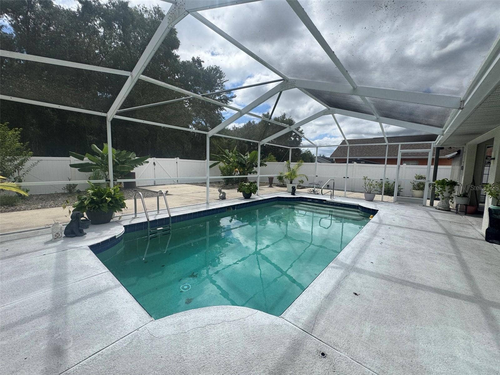 4470 SW 132 PLACE, Ocala, FL 34473 In-ground concrete pool screened