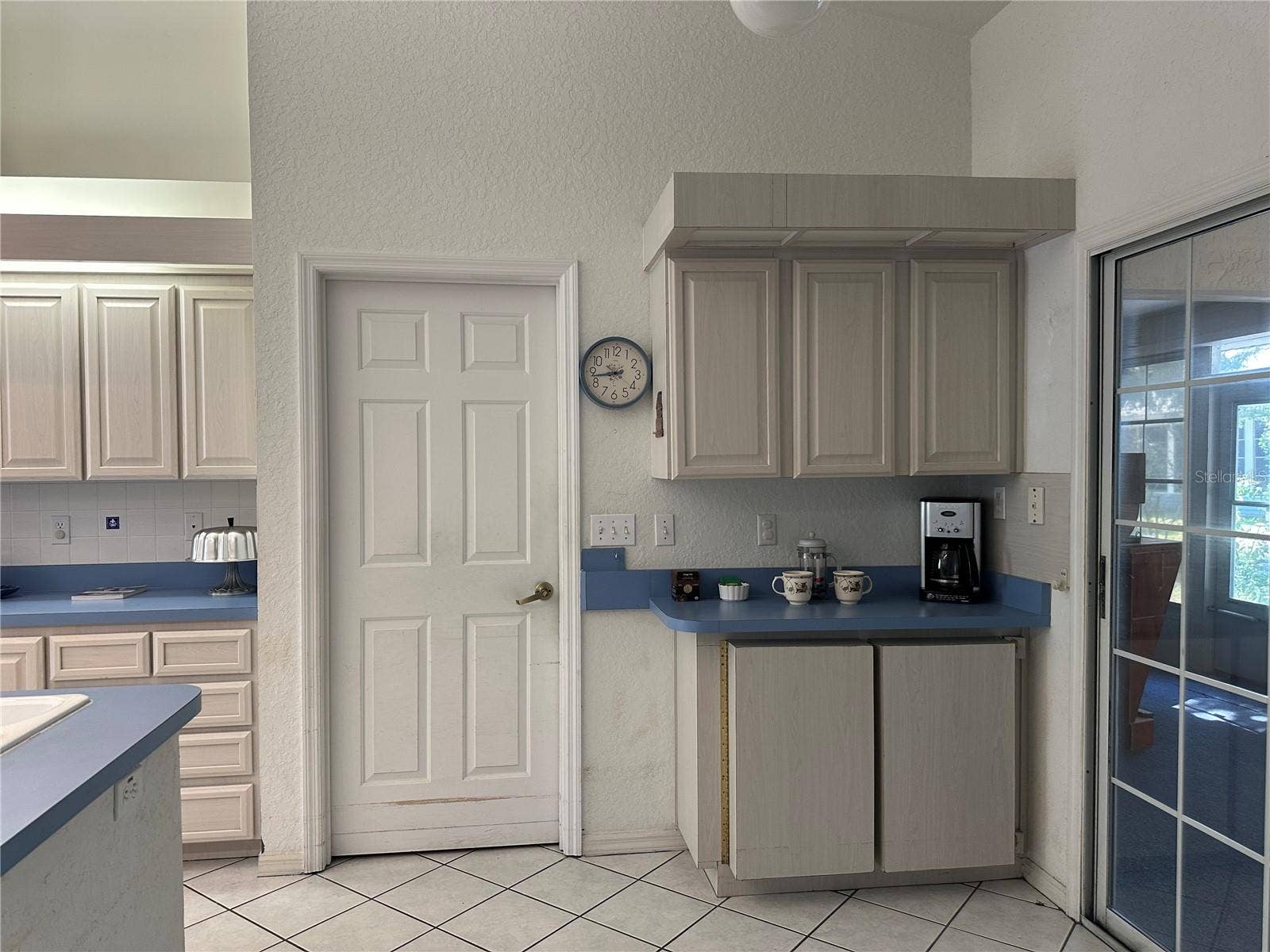 Coffee Bar & Door to indoor laundry room