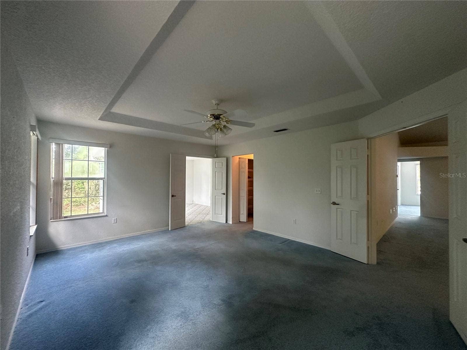 Master Bedroom has tray ceiling & double doors to master bonus room