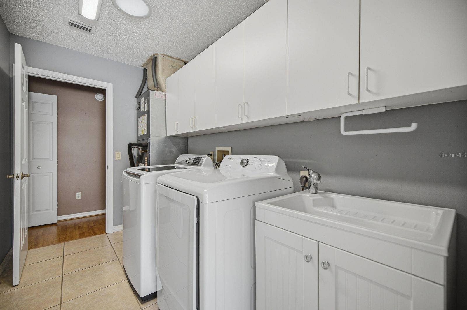 705 MURRAY LANE, Lady Lake, FL 32159 Interior Laundry room