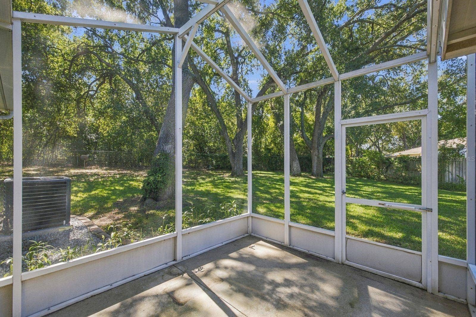 705 MURRAY LANE, Lady Lake, FL 32159 Screened Patio