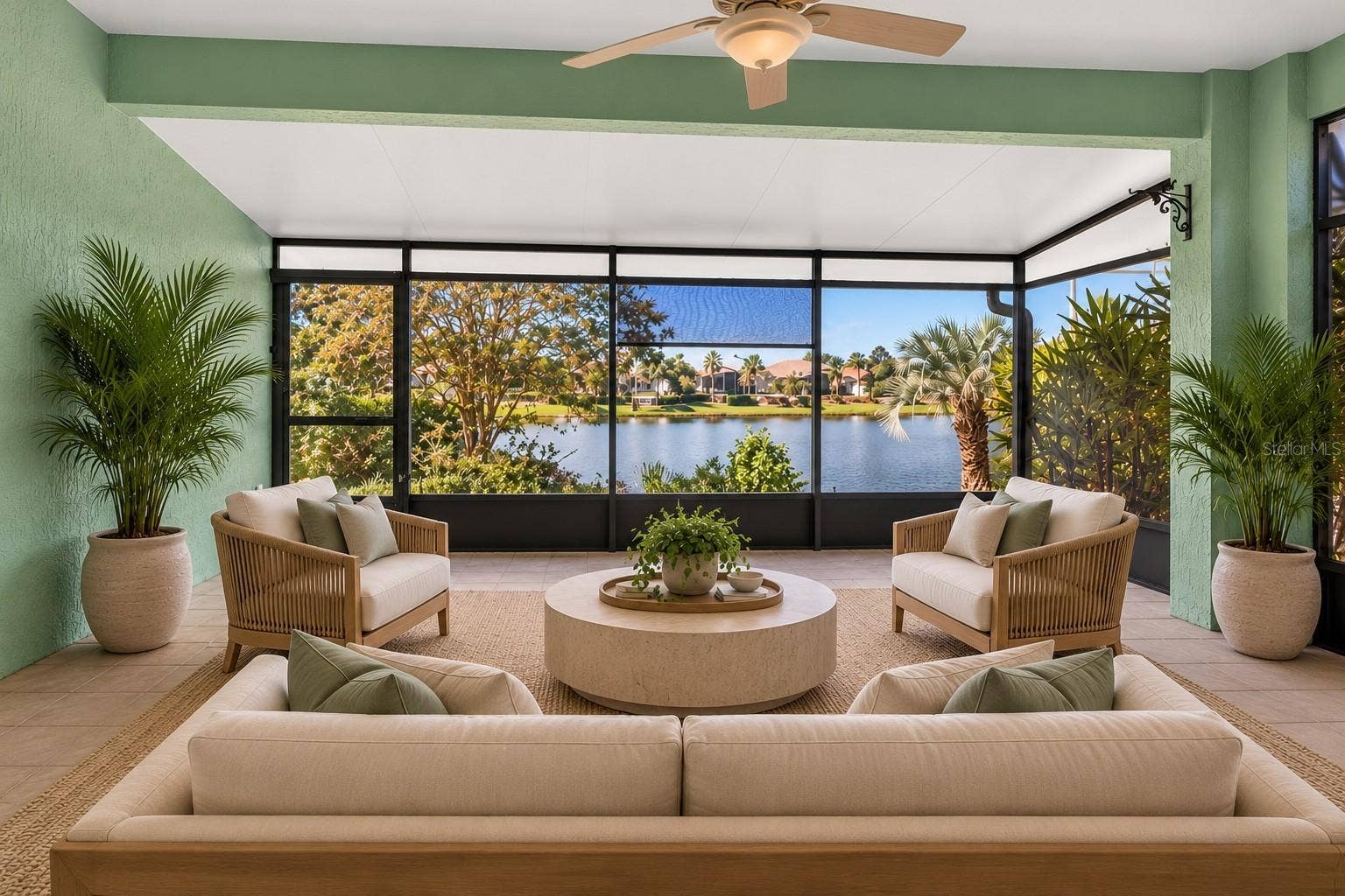 Enclosed lanai with lake view.