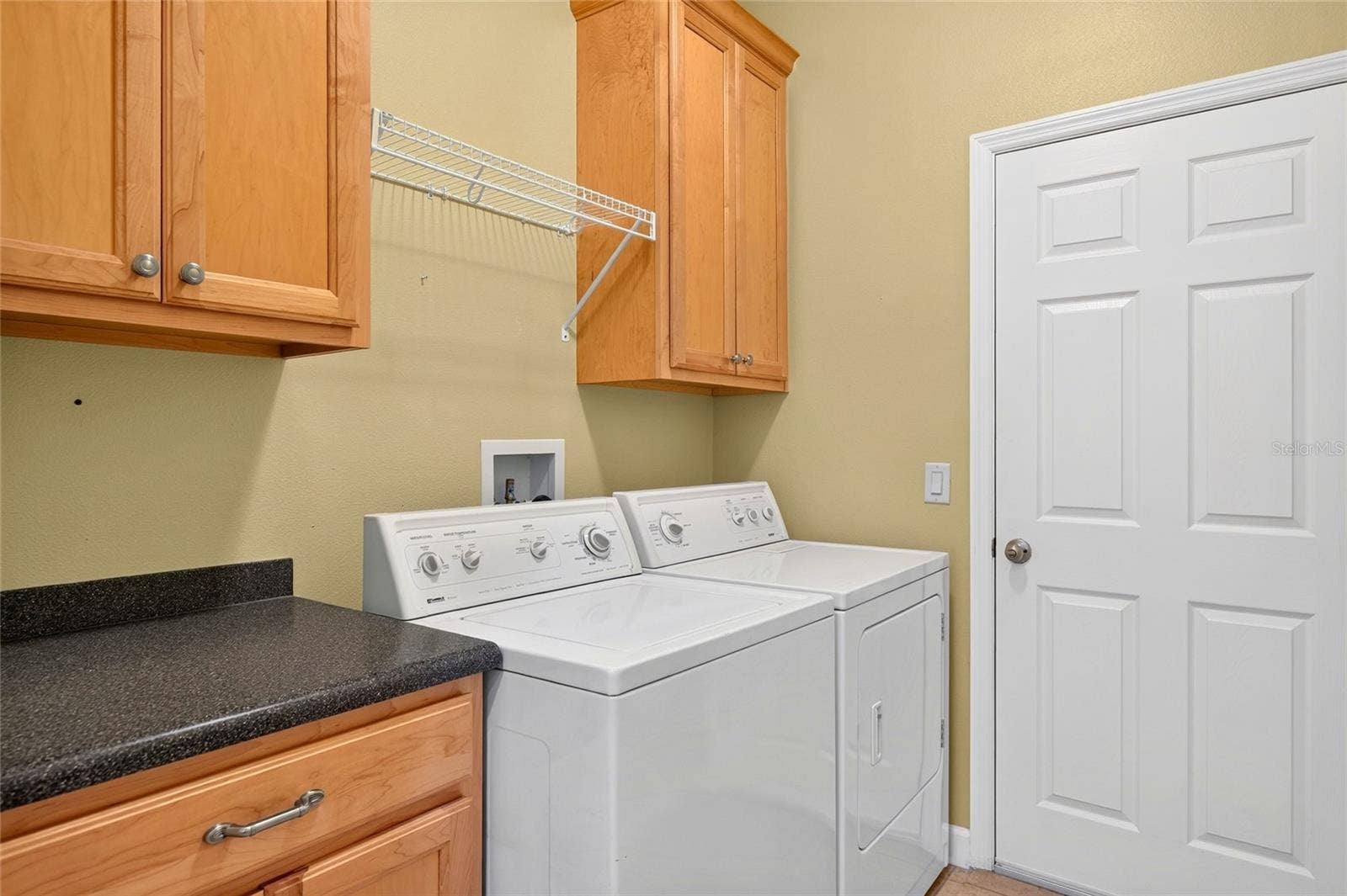 Laundry room with garage access.