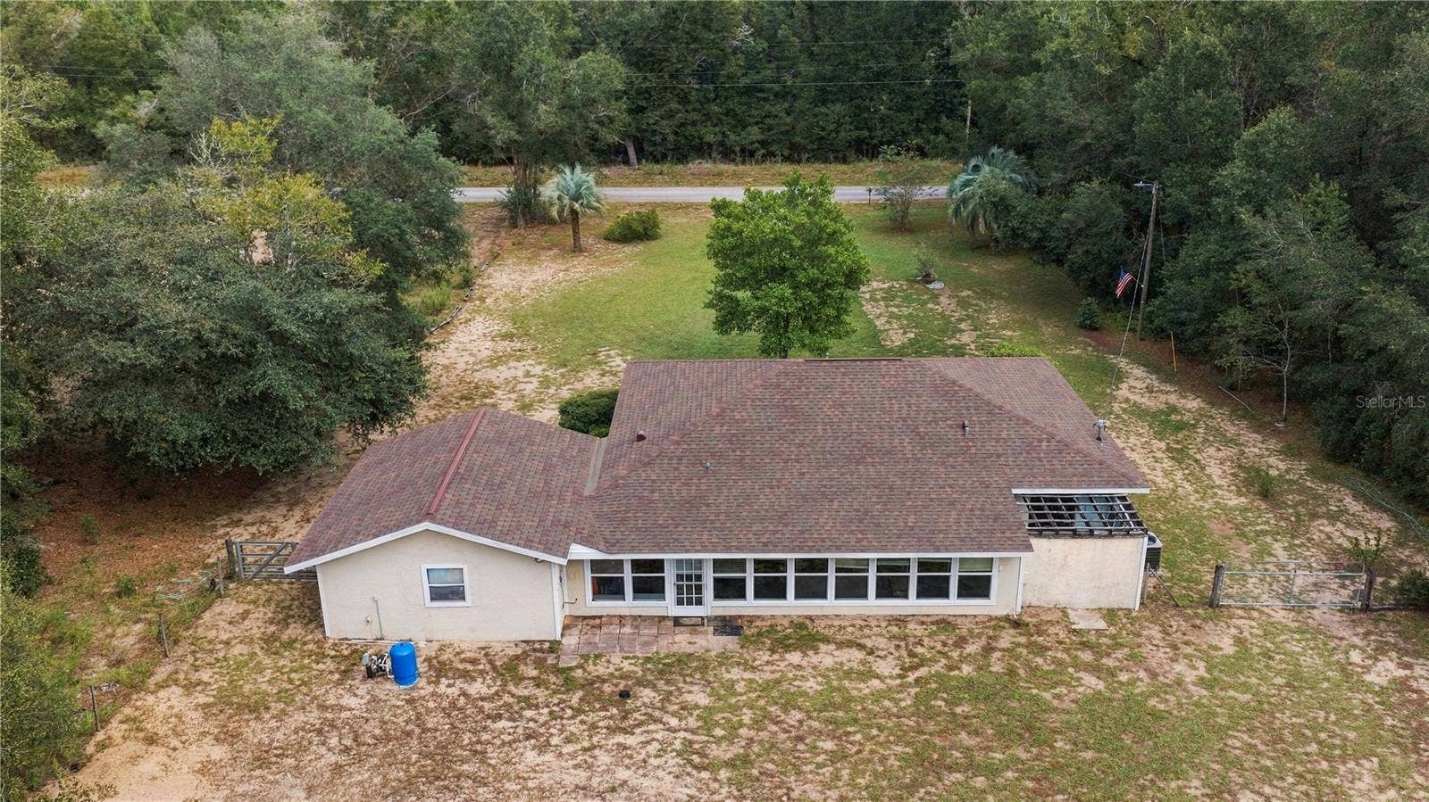 7910 SW 202ND COURT, Dunnellon, FL 34431 REAR OF HOME FROM ABOVE IN THE WESTERLY SKY