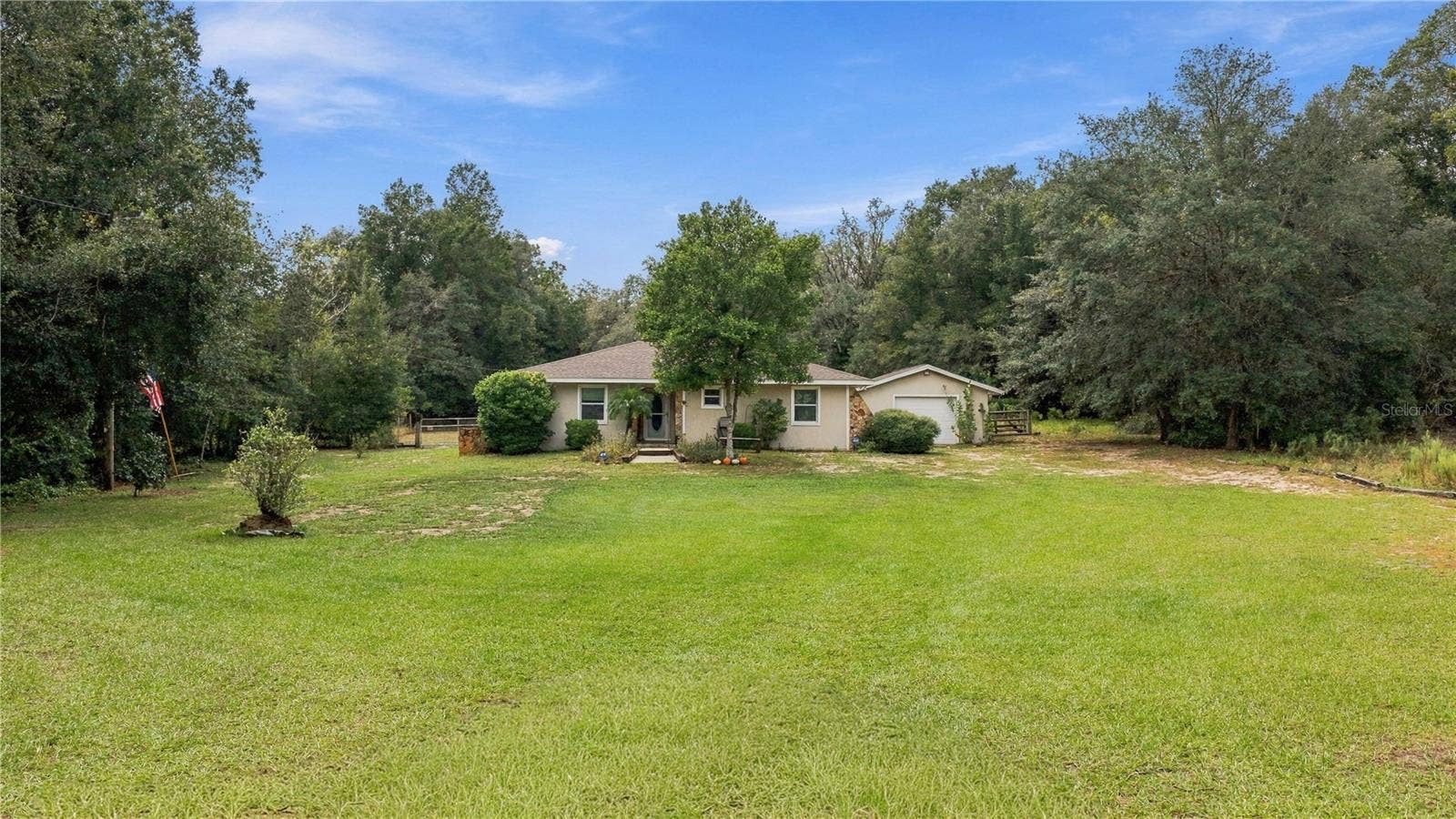7910 SW 202ND COURT, Dunnellon, FL 34431 MAIN FRONT VIEW LOOKING OVER THE XXL FRONT YARD.
