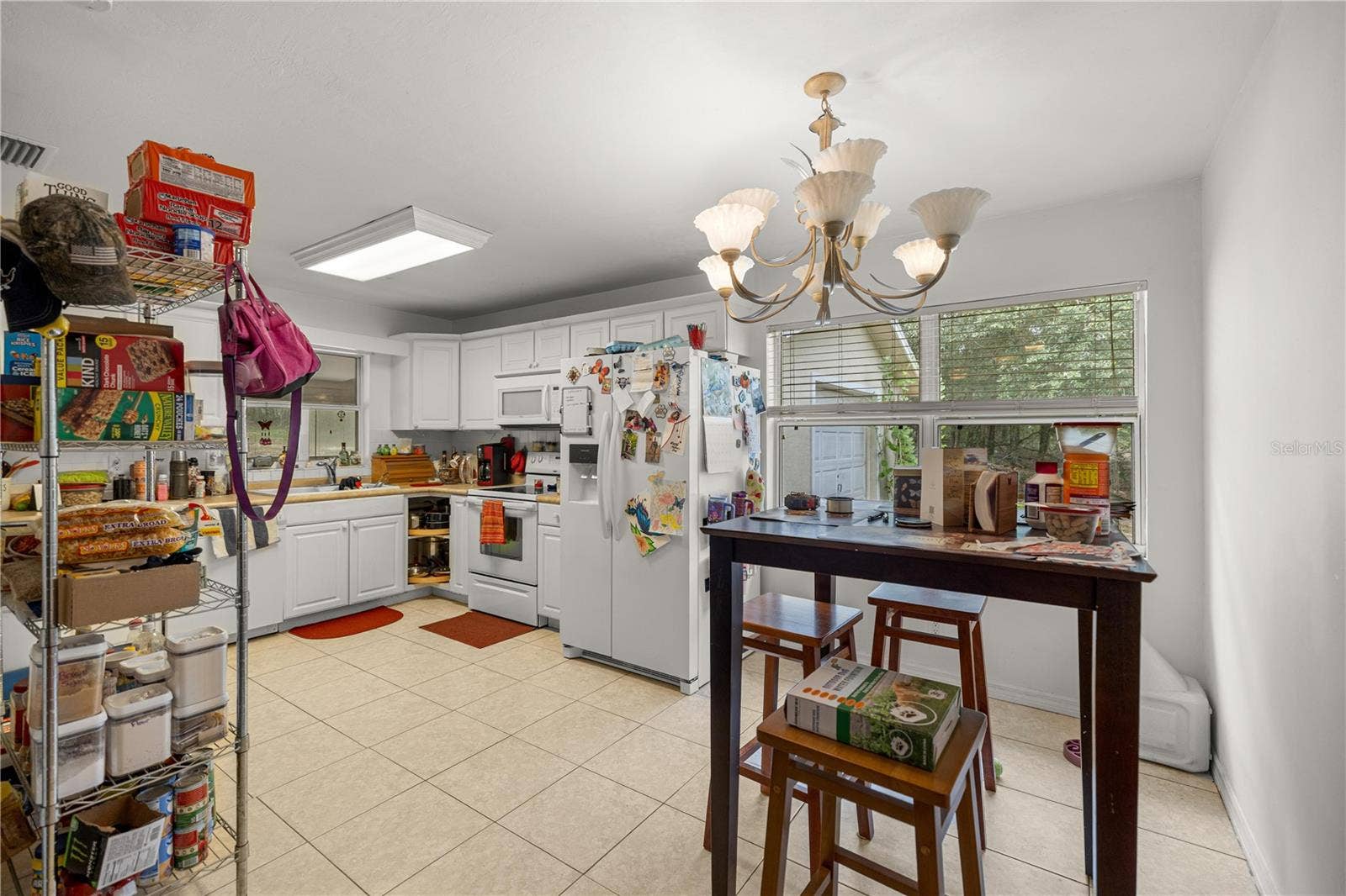 7910 SW 202ND COURT, Dunnellon, FL 34431 FROM LIVING ROOM THRU "EAT IN" TO KITCHEN