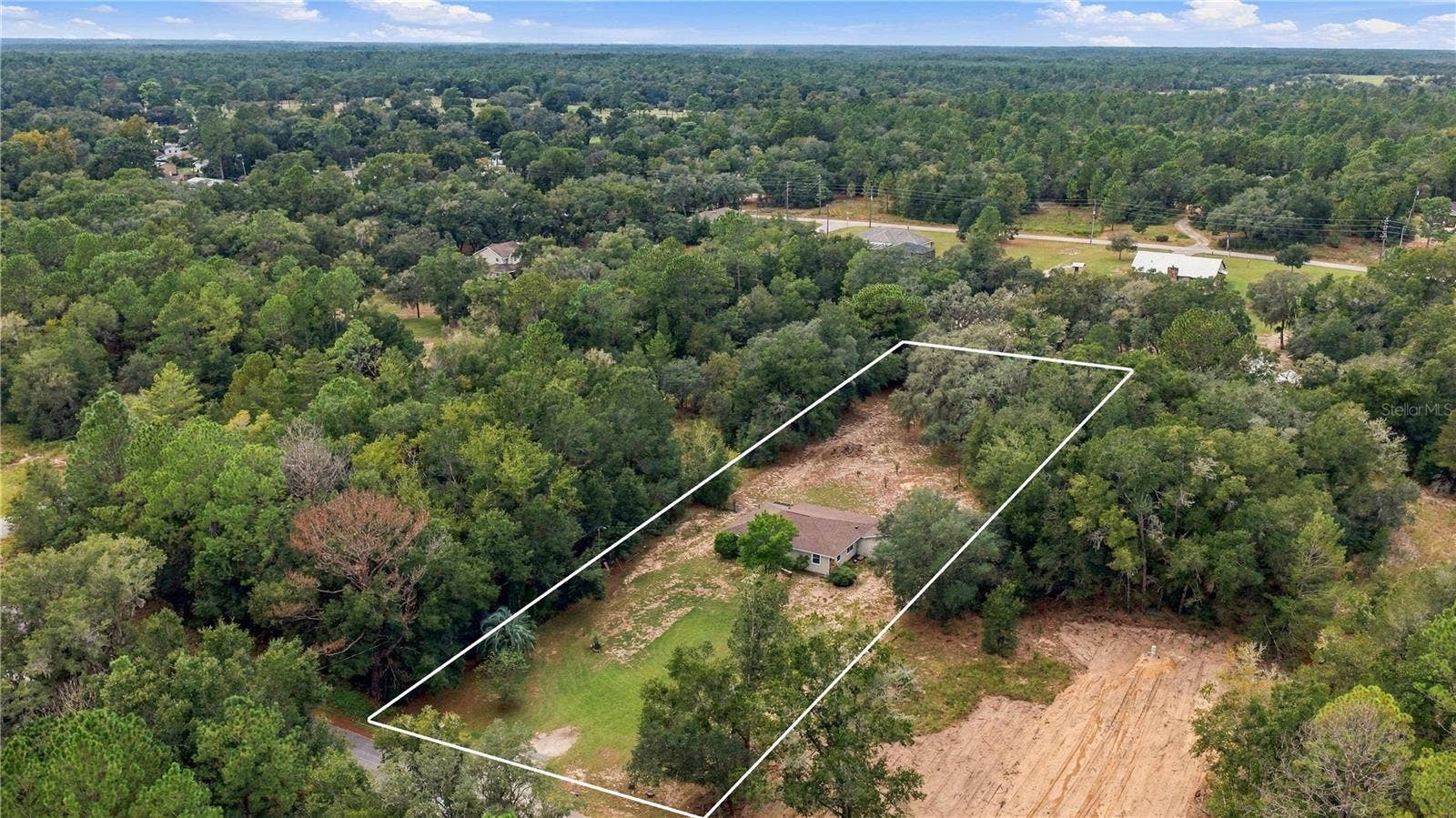 7910 SW 202ND COURT, Dunnellon, FL 34431 AERIAL LOOKING FROM EAST TO WEST