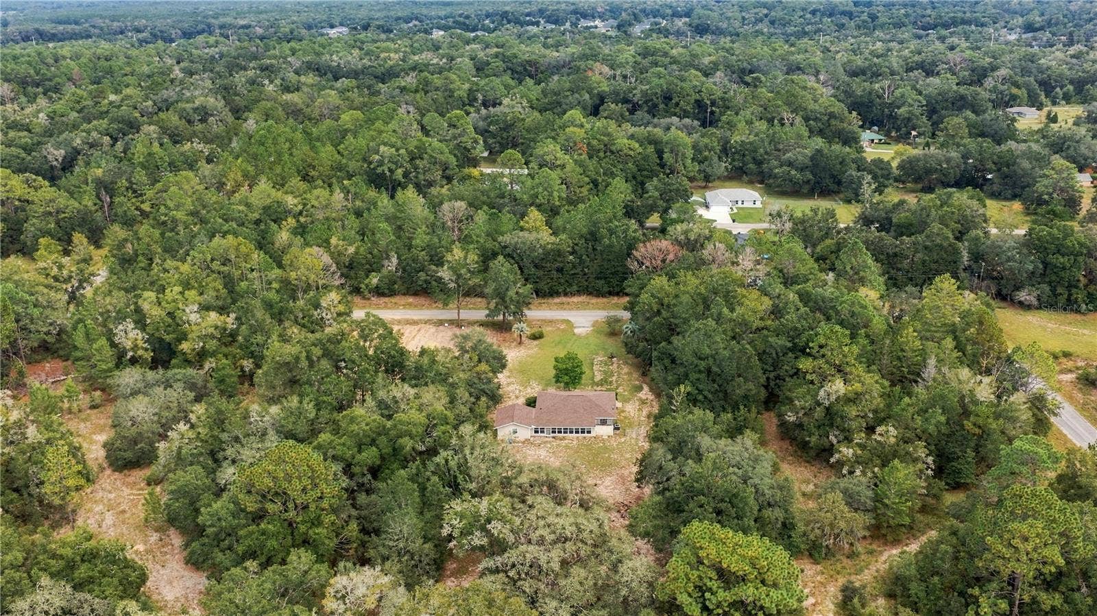 7910 SW 202ND COURT, Dunnellon, FL 34431 from west to east over rear of property & sunroom