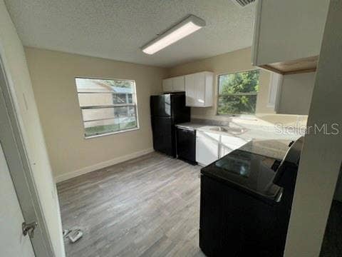 7607 COMO DRIVE, New Port Richey, FL 34655 kitchen view 2