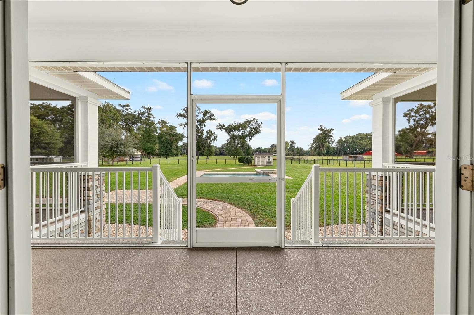 2556 NE 120TH STREET, Anthony, FL 32617 Expansive rear screened porch.