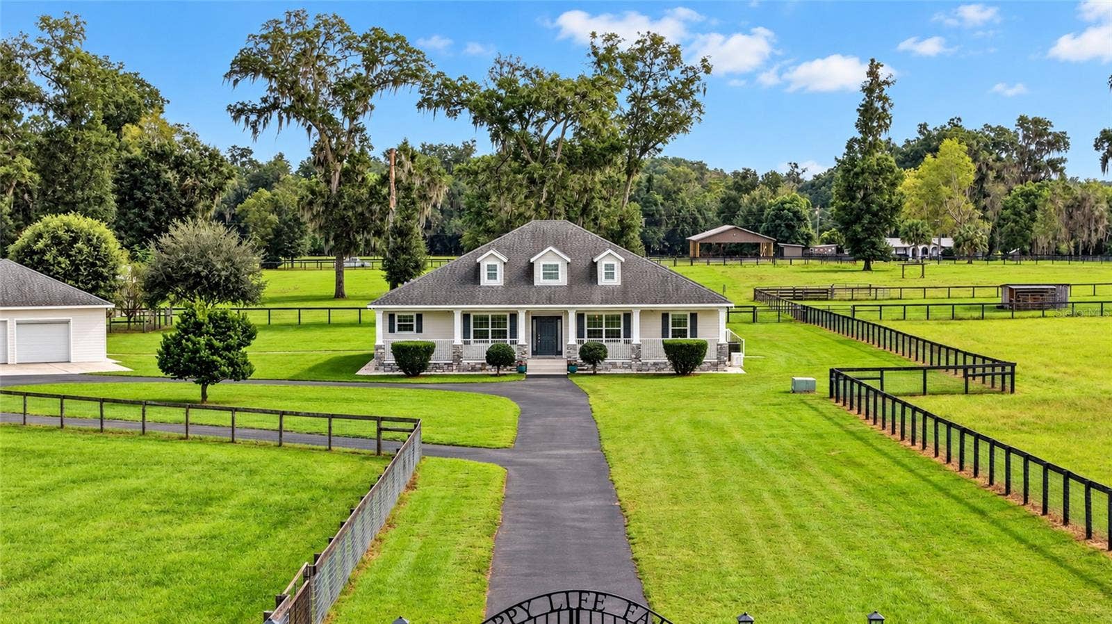 2556 NE 120TH STREET, Anthony, FL 32617 Custom-Built Farmhouse on 13.58 acres.