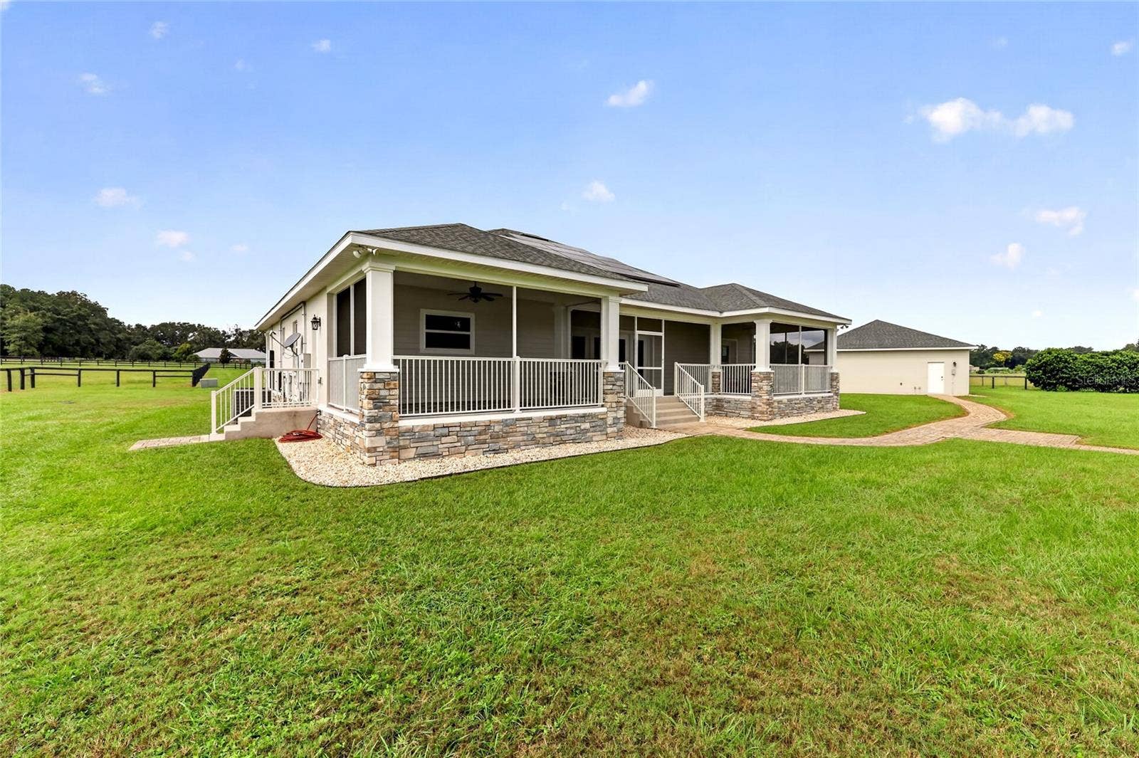 2556 NE 120TH STREET, Anthony, FL 32617 Expansive rear screened porch.