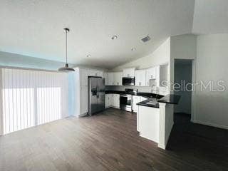 Nice kitchen with dining area. Granite counters, White Shaker cabinets