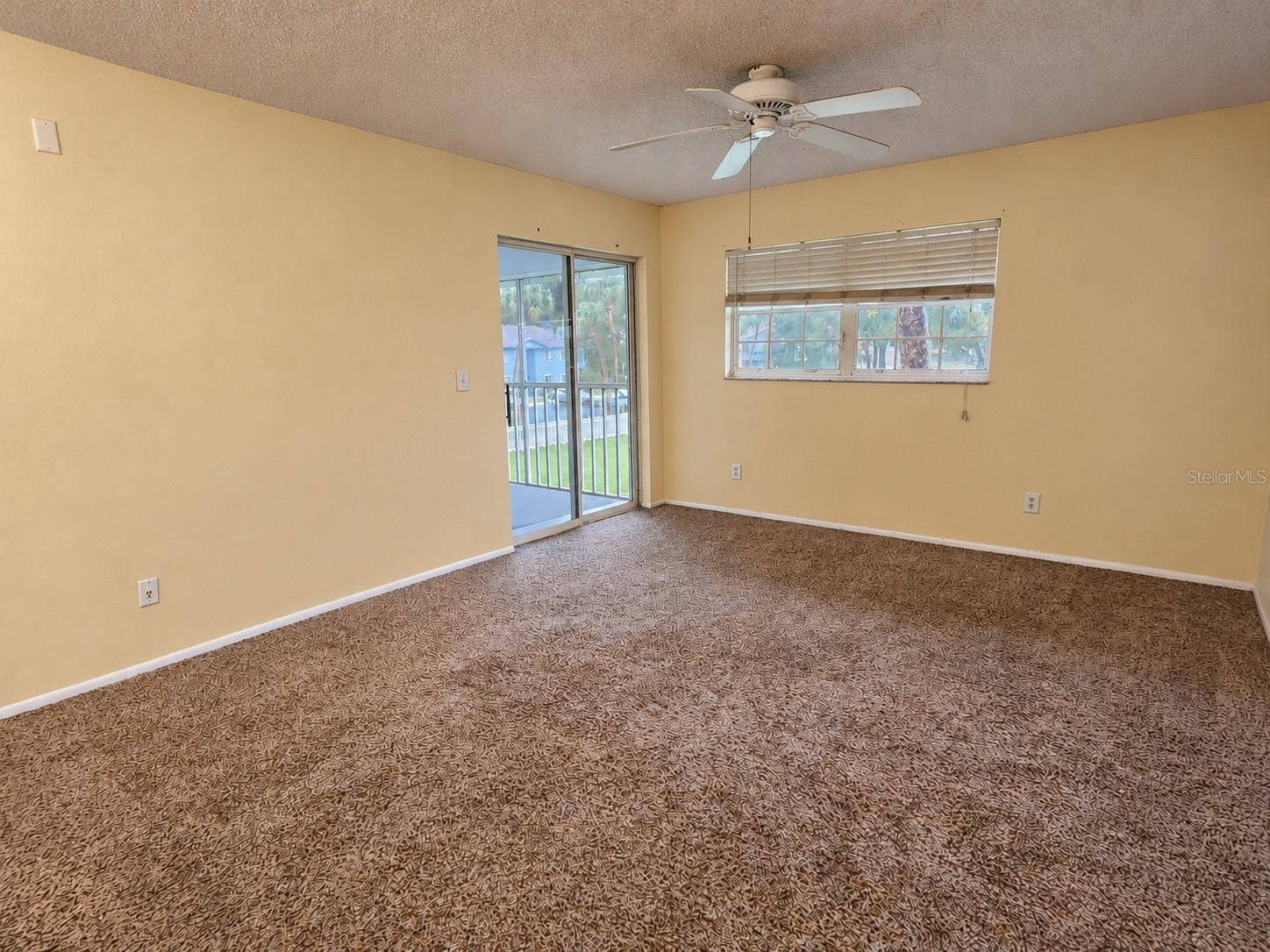 580 FAIRWAYS LANE, #G204, Ocala, FL 34472 Living Room to Porch