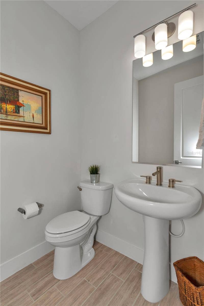 Half bath located off main foyer