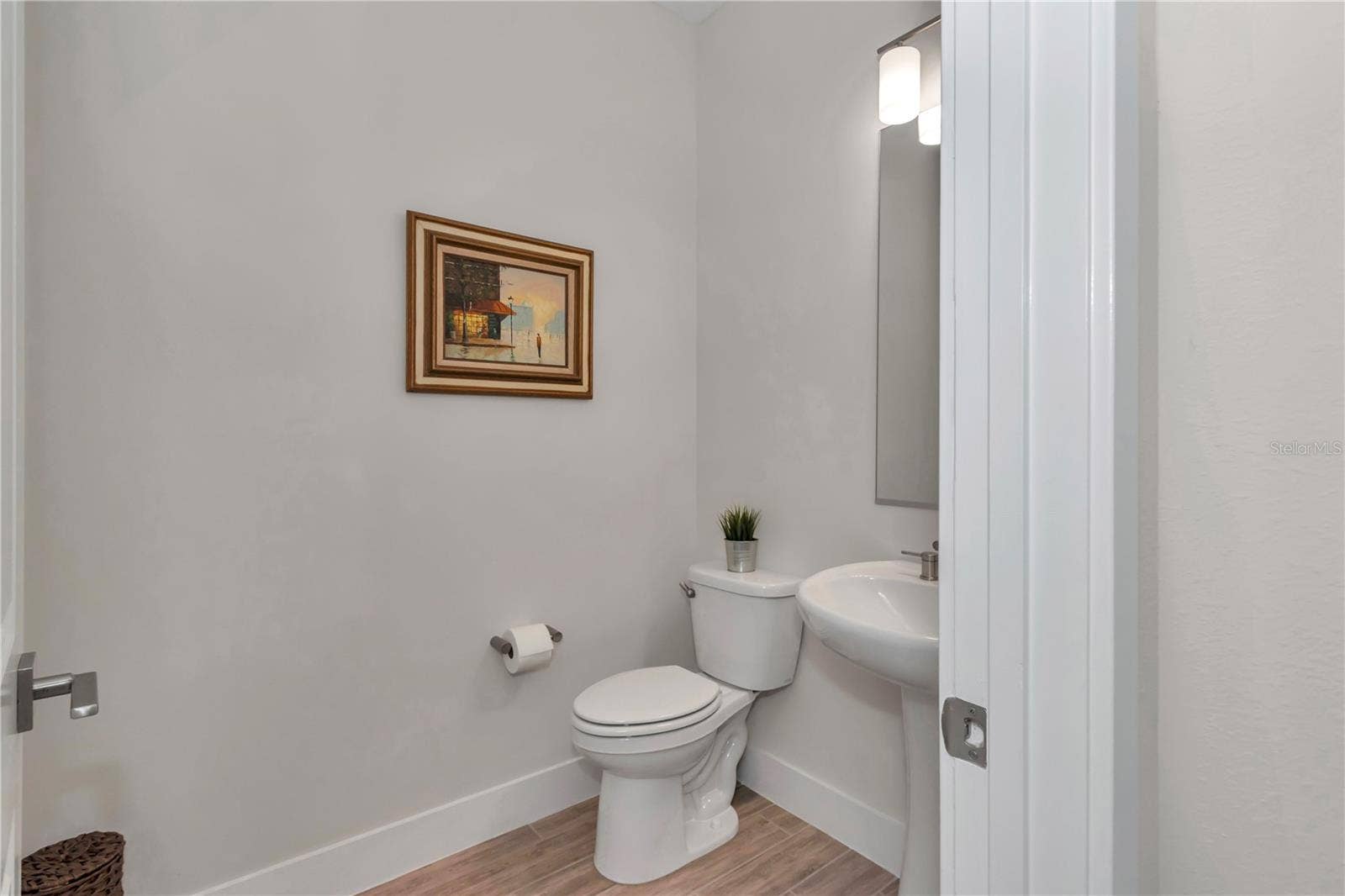 Half bath located off main foyer