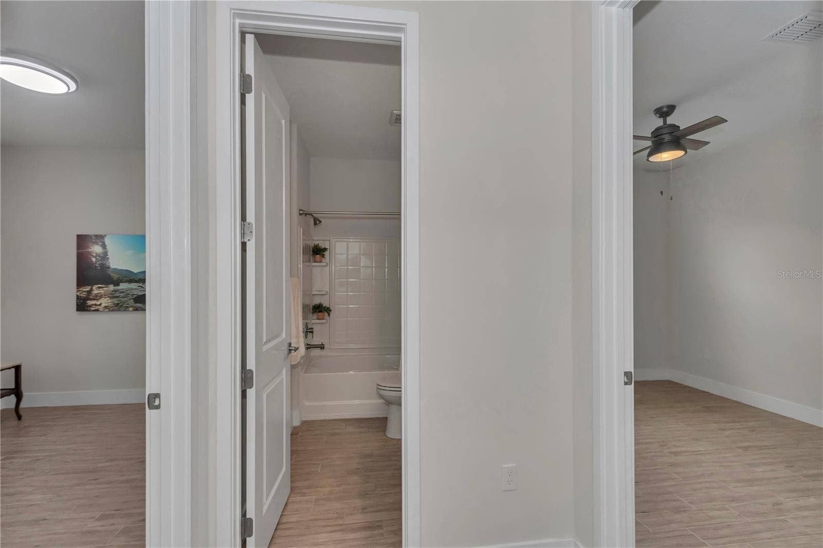 Full bath located between bedroom 2 & bedroom 3