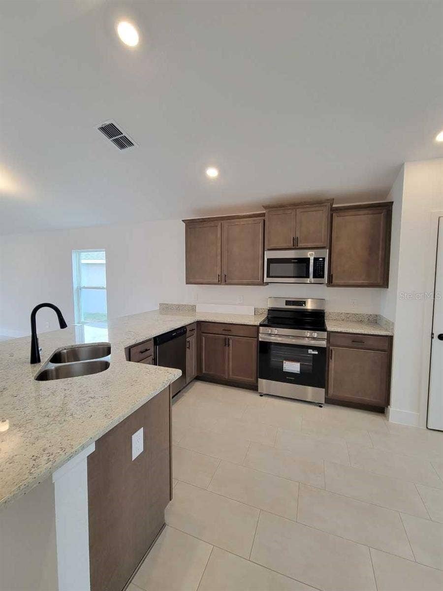 4507 SW 91ST LANE ROAD, Ocala, FL 34476 Picture of similar home for illustrative purposes only. Colors and features will vary!
