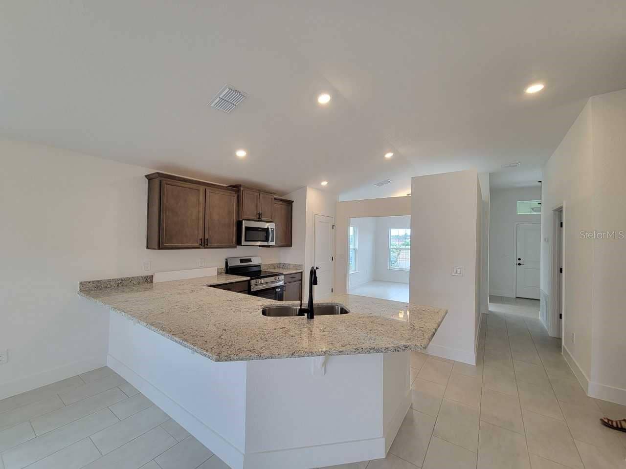 4507 SW 91ST LANE ROAD, Ocala, FL 34476 Picture of similar home for illustrative purposes only. Colors and features will vary!