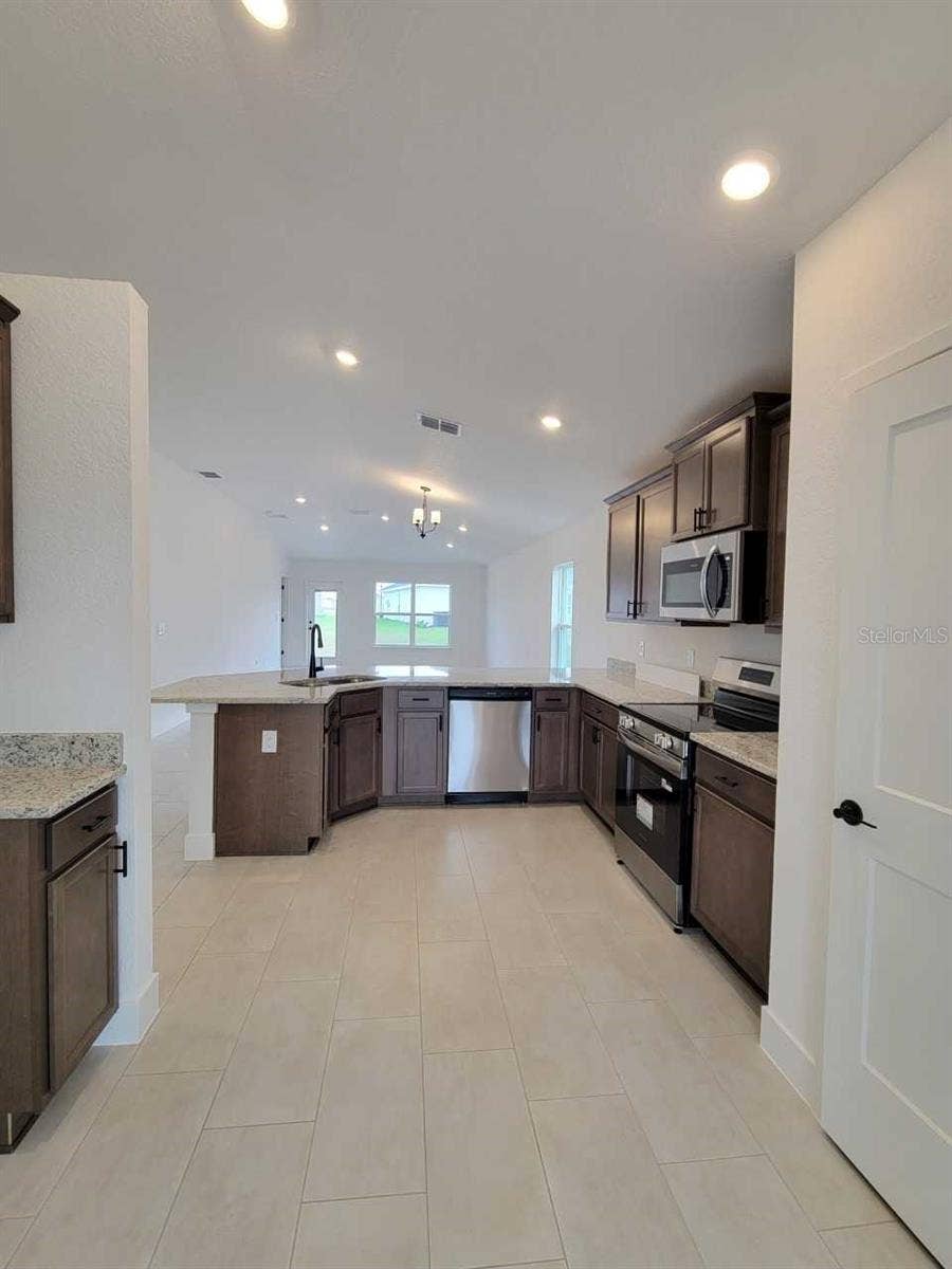 4507 SW 91ST LANE ROAD, Ocala, FL 34476 Picture of similar home for illustrative purposes only. Colors and features will vary!