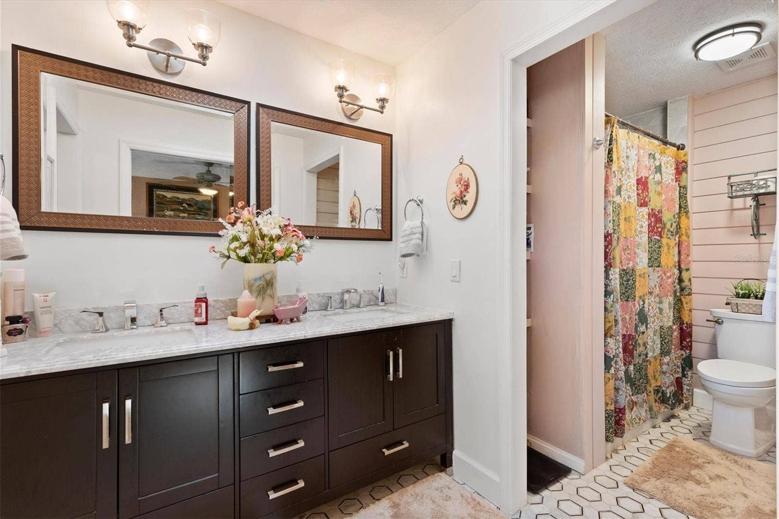 17432 SE 112TH COURT, Summerfield, FL 34491 En-suite bathroom with Dual sink vanity, separate walk-in shower, large walk-in closet.