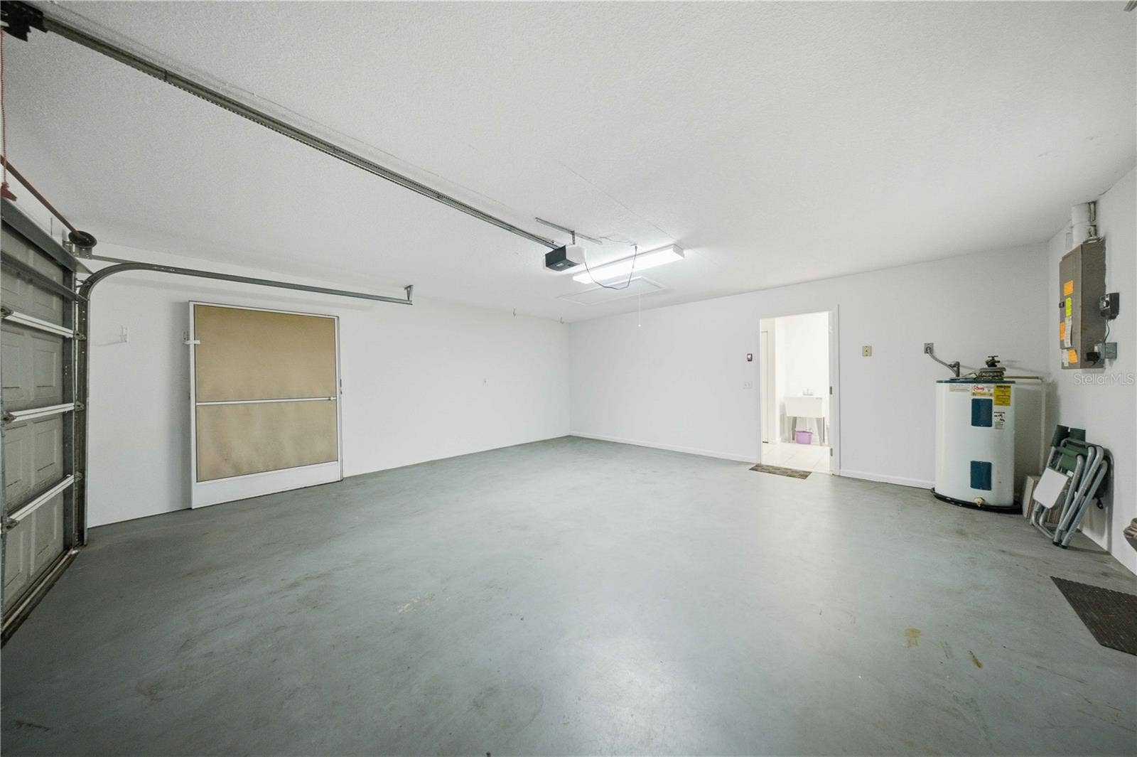 5126 NW 21ST LOOP, Ocala, FL 34482 Attached garage with opener and screens