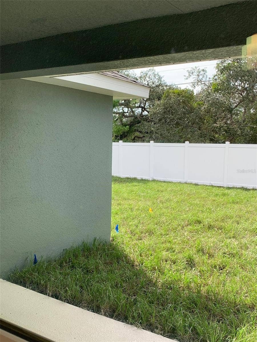 11603 GRACE ROAD, Weeki Wachee, FL 34614 Back patio/yard