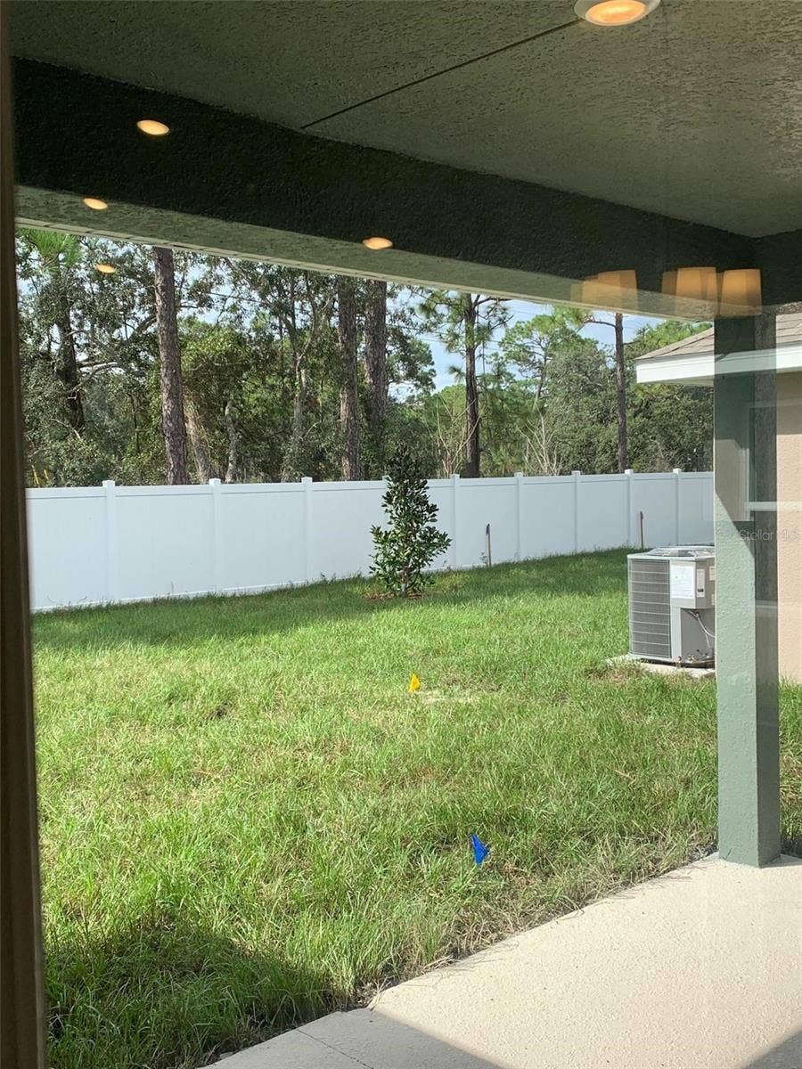 11603 GRACE ROAD, Weeki Wachee, FL 34614 Back patio/yard