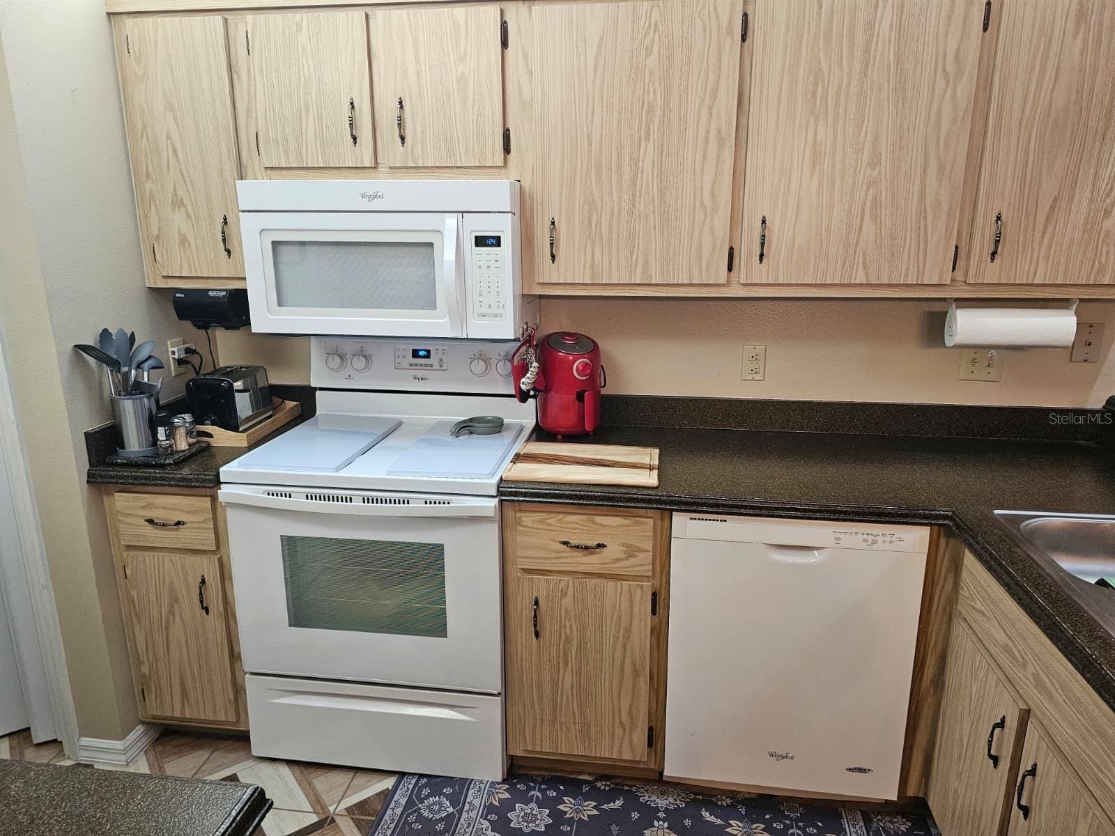 Kitchen stove and space saver microwave