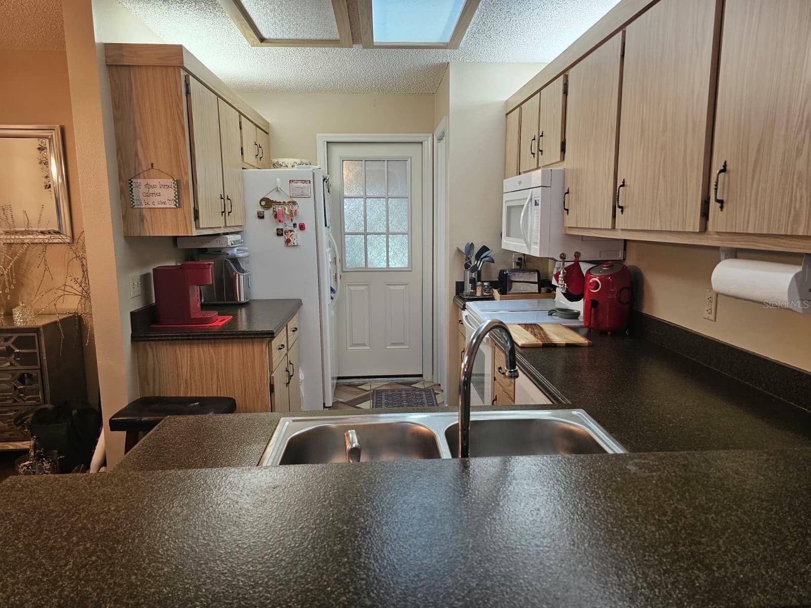 Looking into the kitchen from the bar top