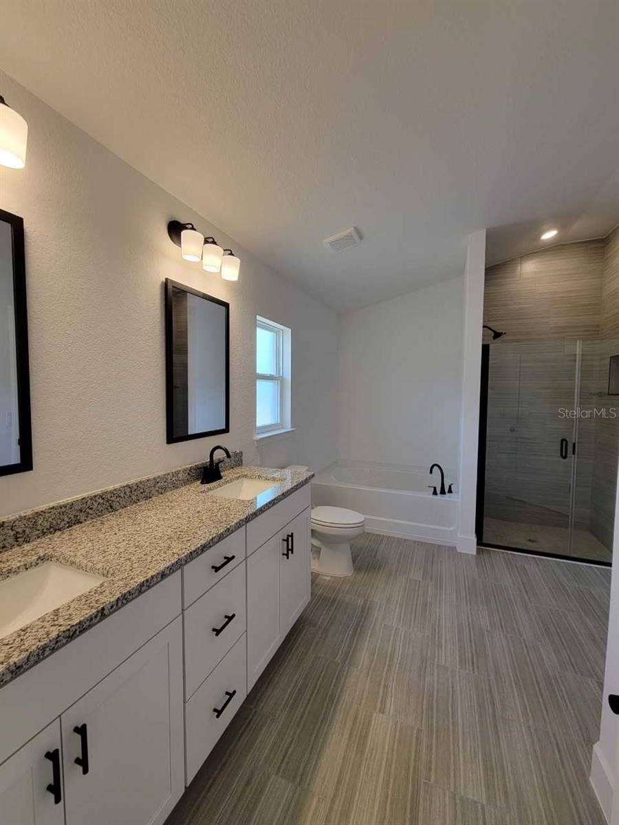 4501 SW 91ST LANE ROAD, Ocala, FL 34476 Home will have tile shower and linen closet. No tub! Picture of similar home features and colors will vary!