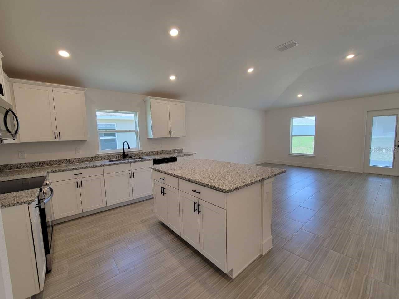 4501 SW 91ST LANE ROAD, Ocala, FL 34476 Picture of similar home for illustrative purposes only! Colors and features will vary!