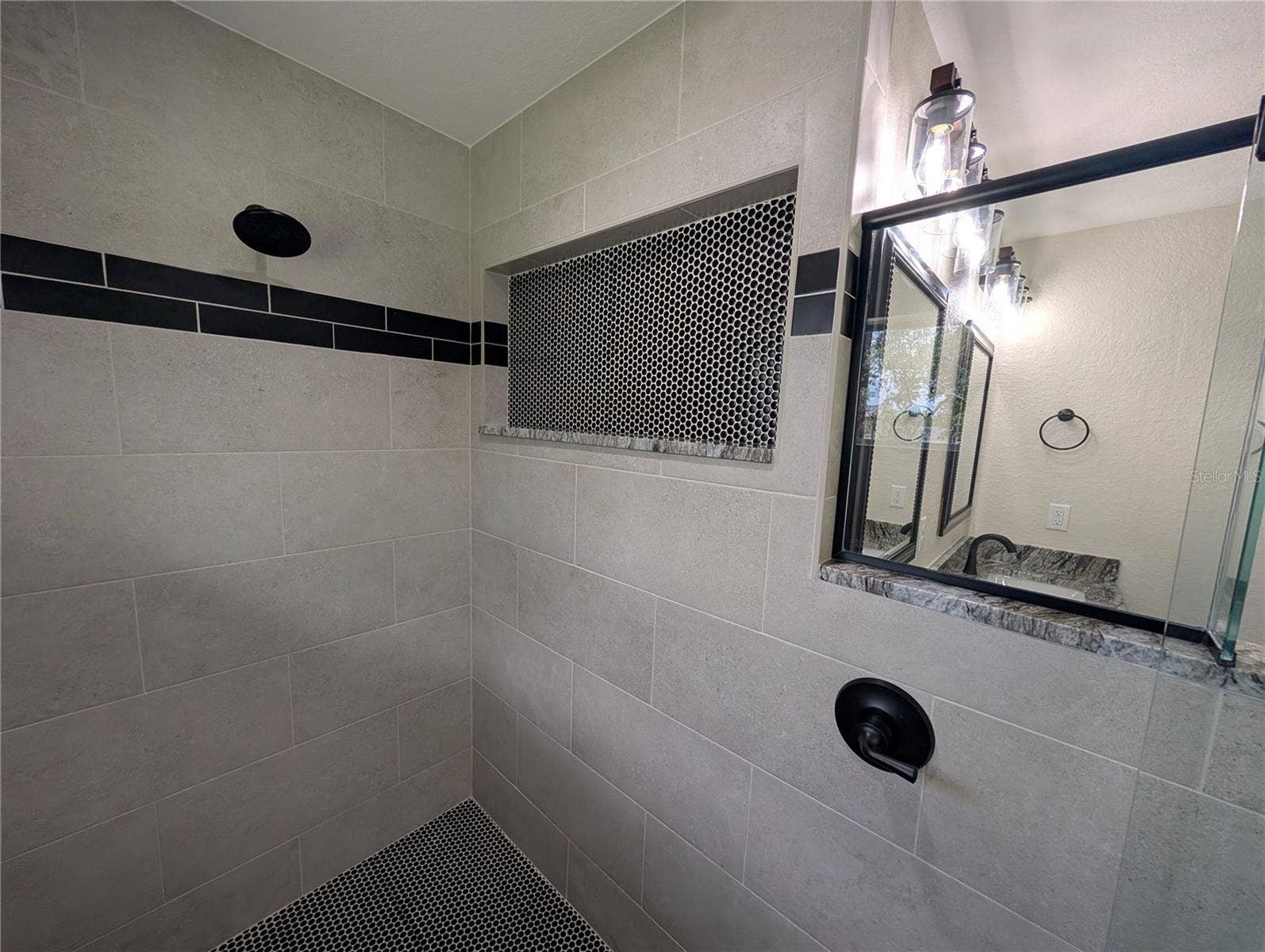 Photos are of same model  Fixtures, colors, flooring will vary