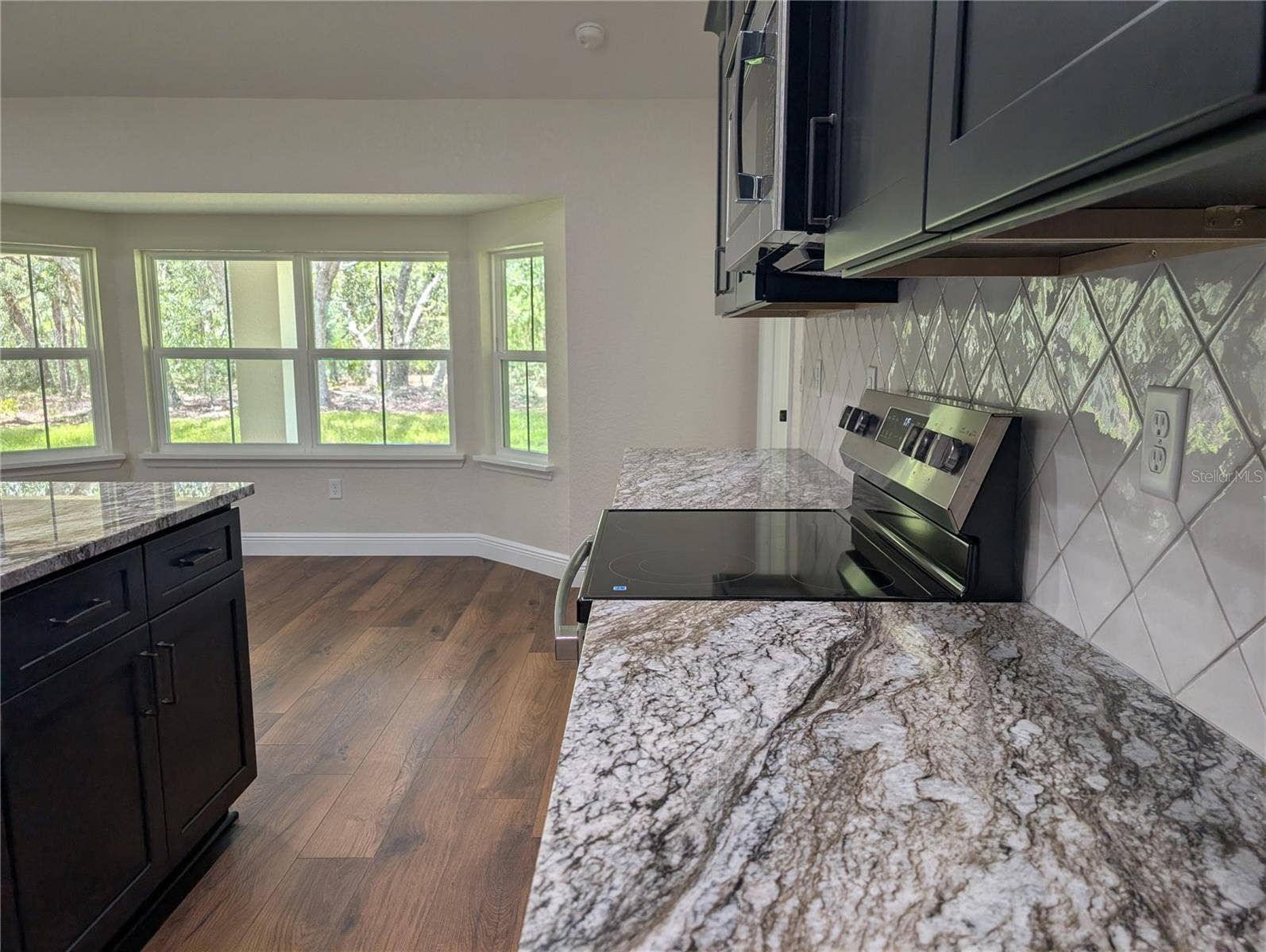 Photos are of same model  Fixtures, colors, flooring will vary