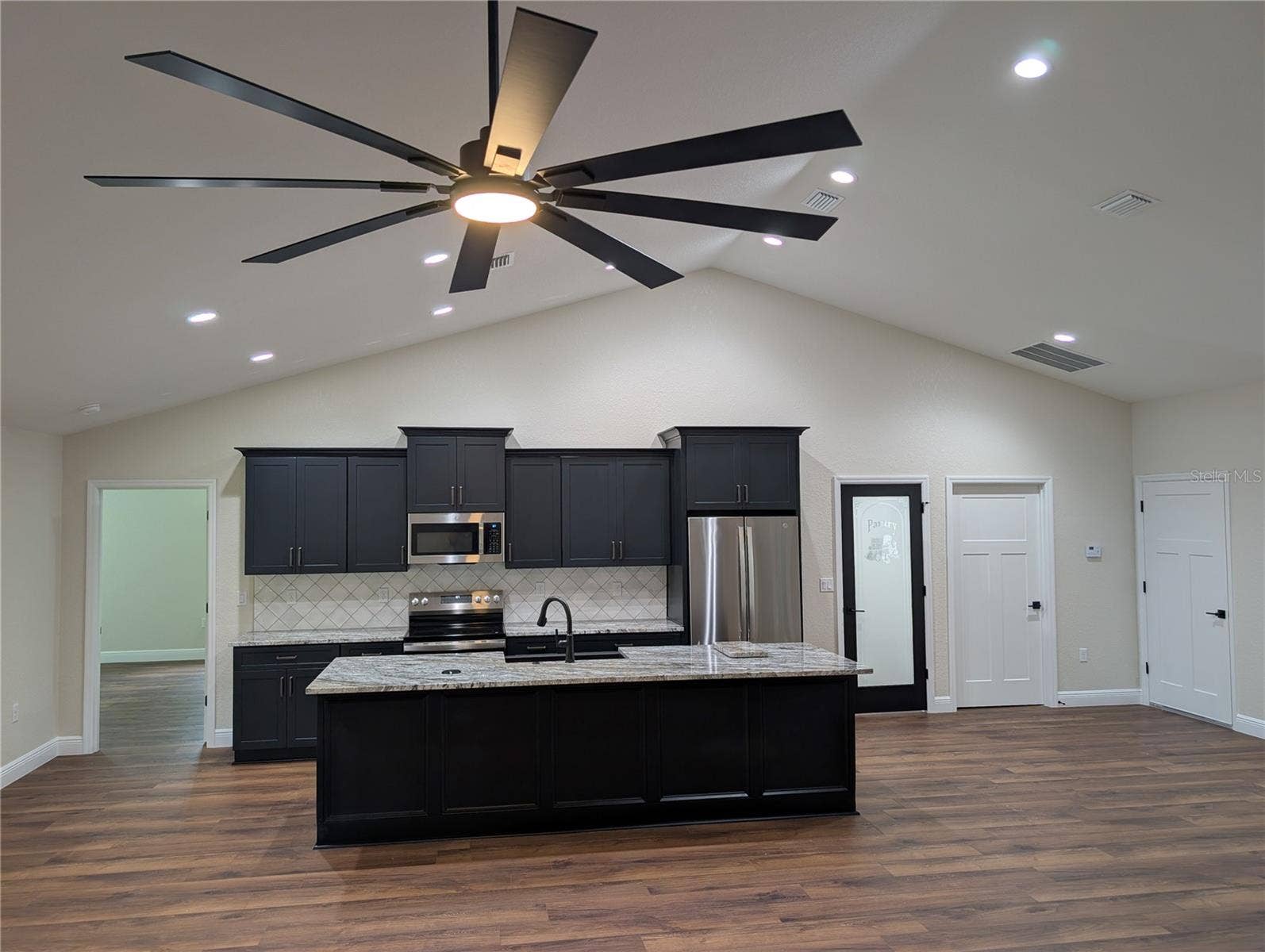 Photos are of same model  Fixtures, colors, flooring will vary